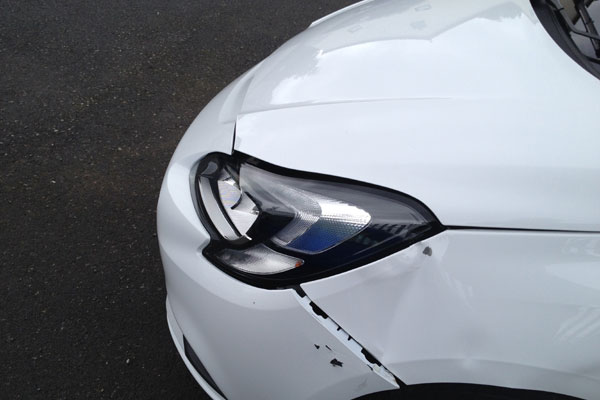 Corsa with minor front end damage to wing and frint bumper